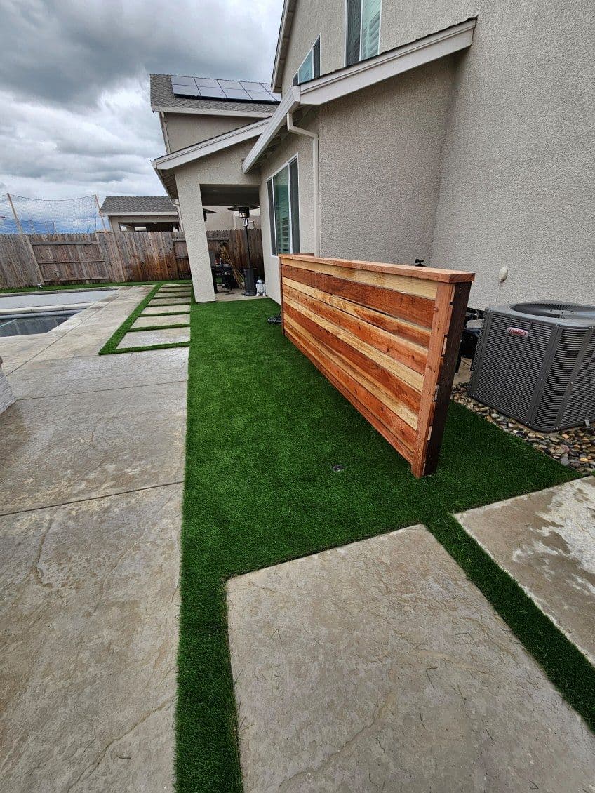 Gallery photos for Backyard Transformation with Artificial Grass and Custom Enclosure: Image #2