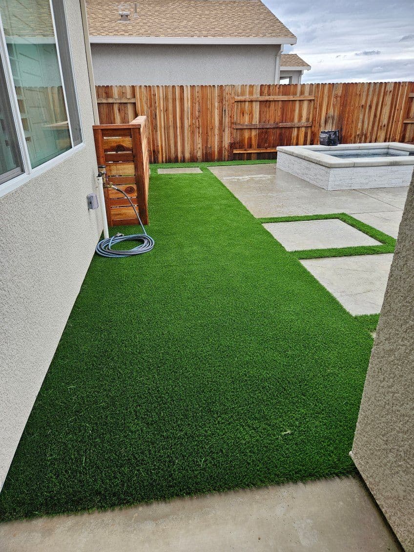 Backyard Transformation with Artificial Grass and Custom Enclosure