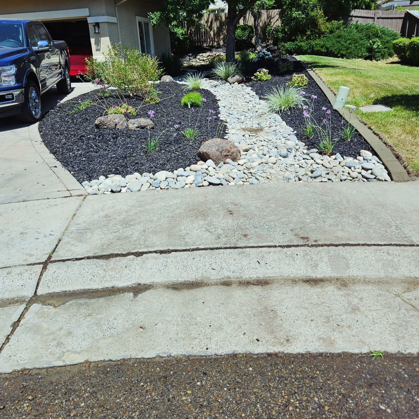 Front Yard Transformation with Mulch and Dry Creek Bed