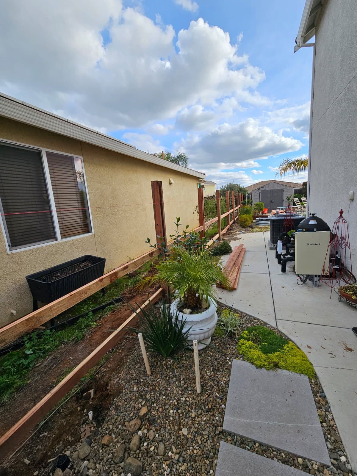 Backyard Transformation with Redwood Fence Replacement image