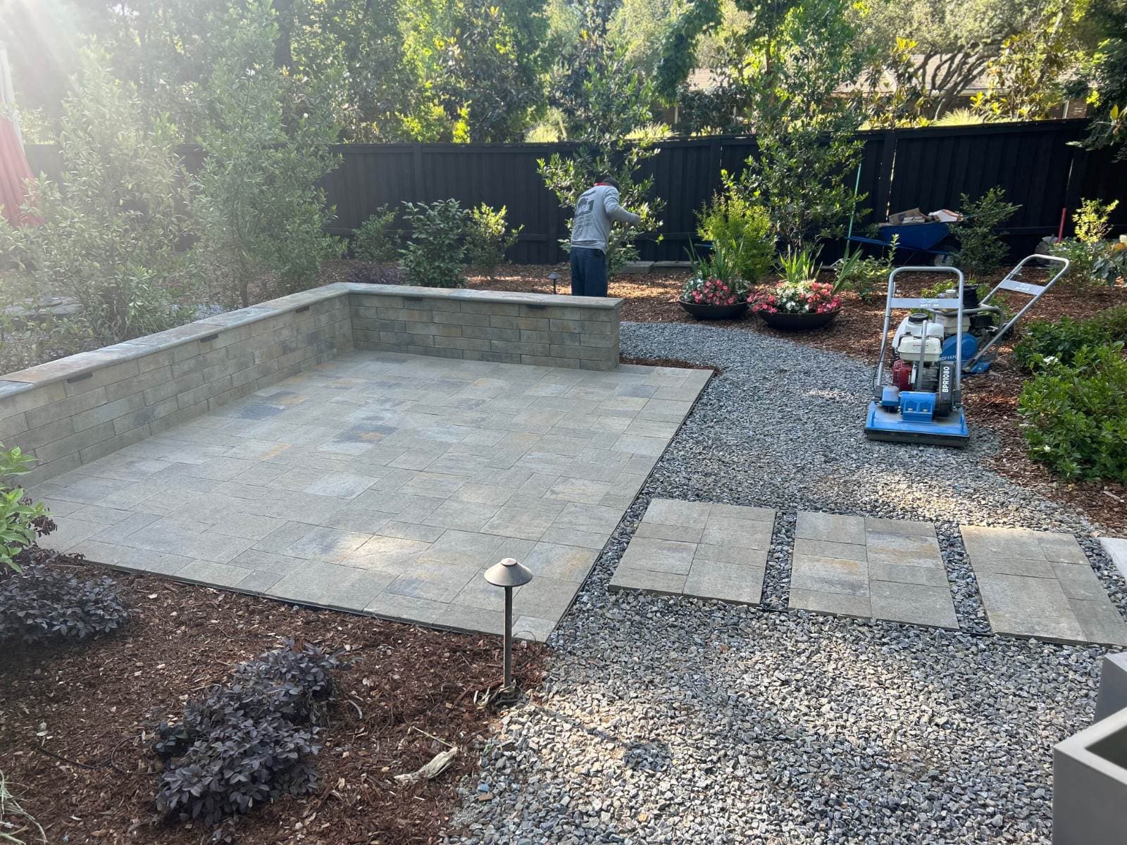 Gallery photos for Serene Backyard Oasis with Pavers and Sitting Wall: Image #1