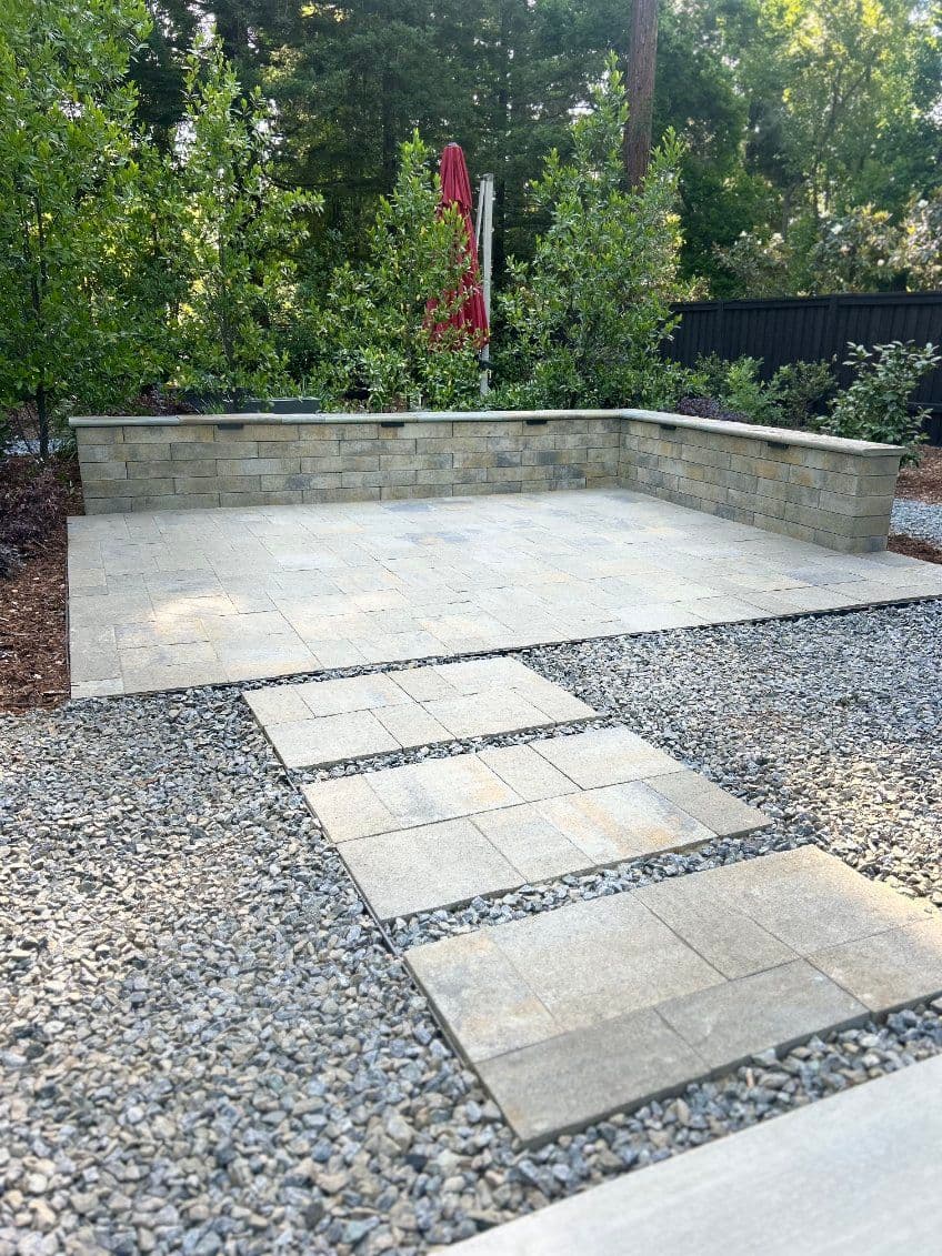 Gallery photos for Serene Backyard Oasis with Pavers and Sitting Wall: Image #2
