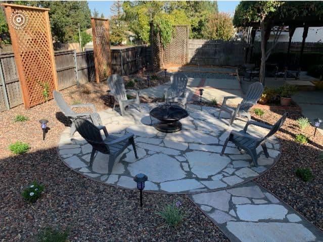 Stunning Flagstone Patio with Cozy Fire Pit image